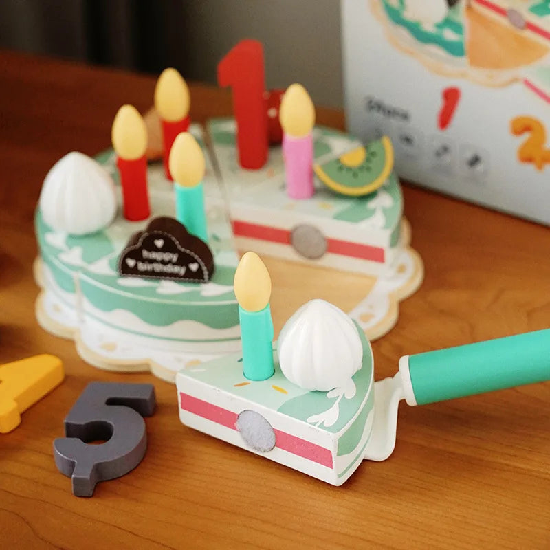Wooden cake slice beside the remaining cake, with a toy slicer and number three decoration
