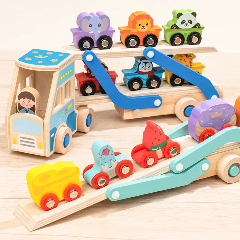 Animal and food-themed vehicles displayed on wooden carrier trucks with folding ramps.