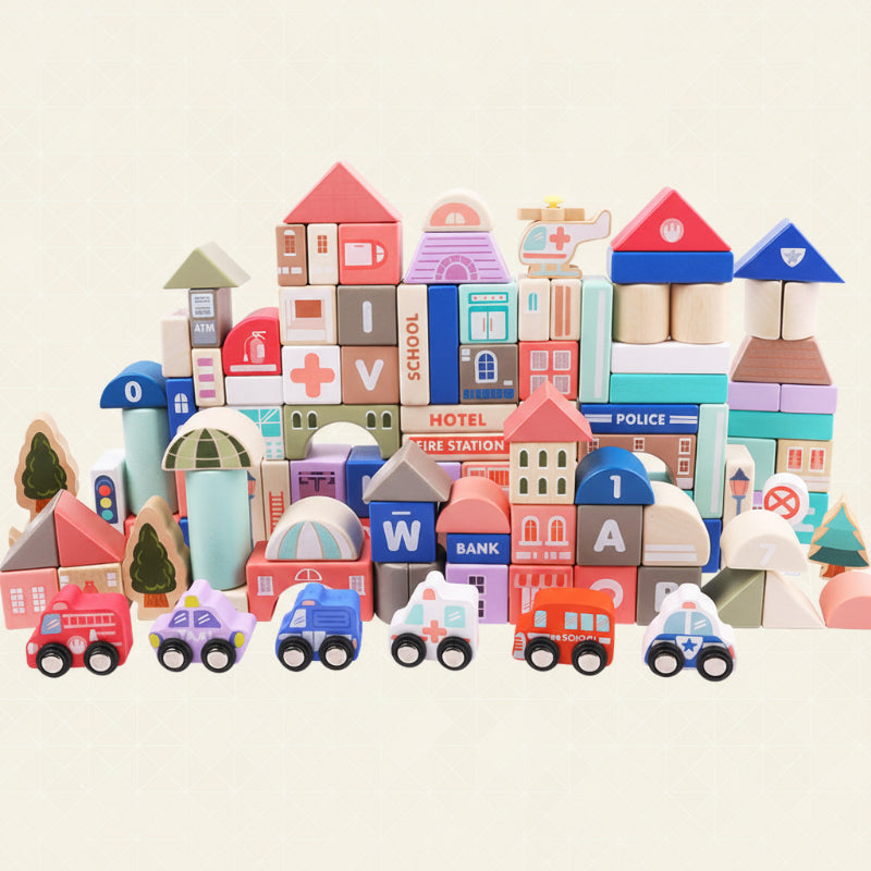 Wooden city buildings with colorful rooftops and a row of toy vehicles