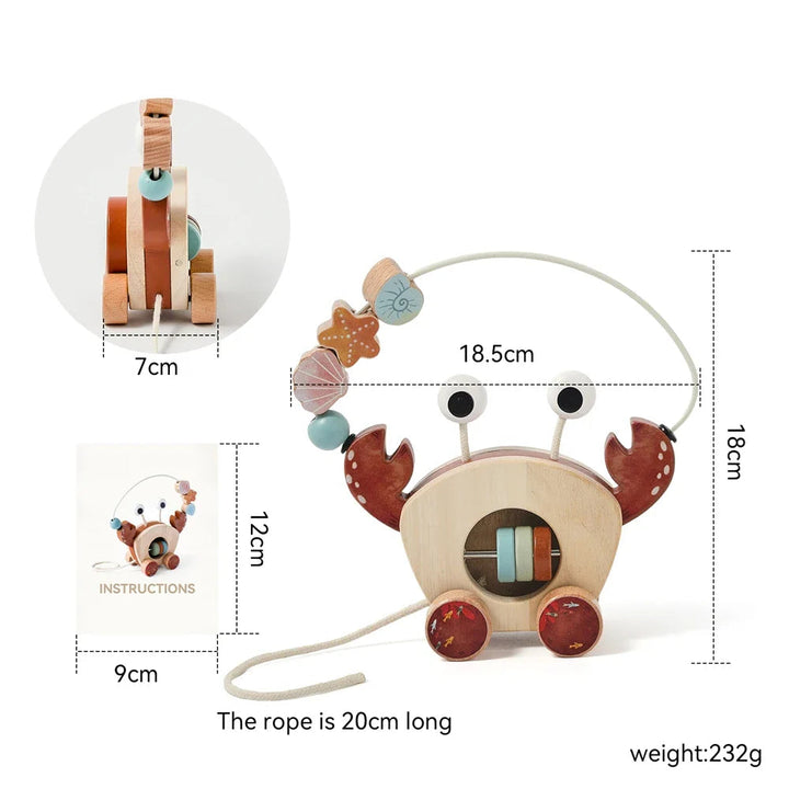 Measurement diagram of a wooden crab toy showing 18.5 cm width, 18 cm height, and 7 cm depth