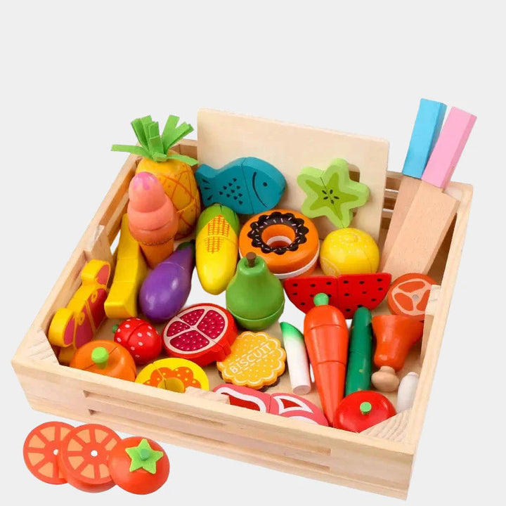 Wooden basket filled with colorful pretend fruit, vegetables, sweets, and toy knives