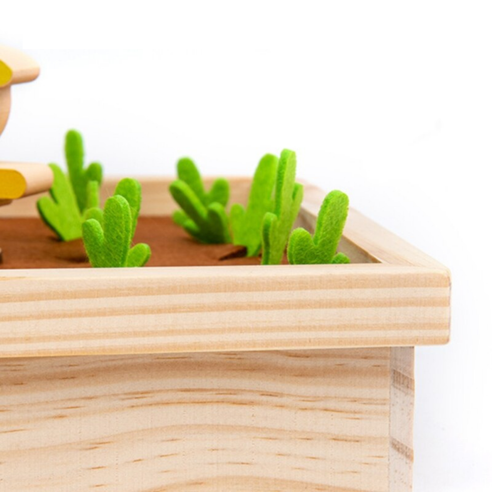 Close-up of the wooden garden box with green felt vegetable tops