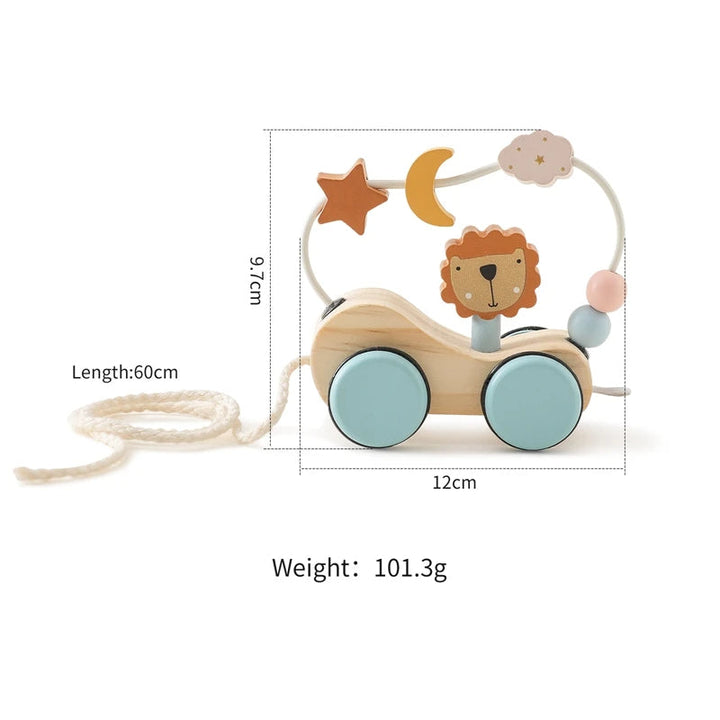 Wooden lion pull toy with a bead maze, moon and star details, and labeled dimensions
