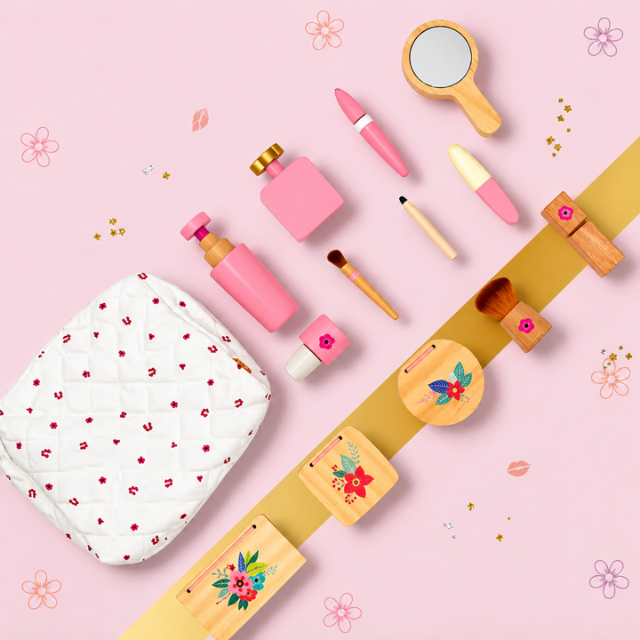 Wooden makeup play accessories and a white patterned storage bag arranged on a pink background
