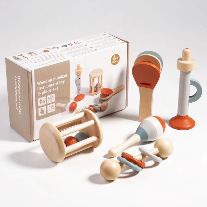 Five-piece wooden musical toy set with rattles, a maraca, a clapper, a recorder-style toy and its box