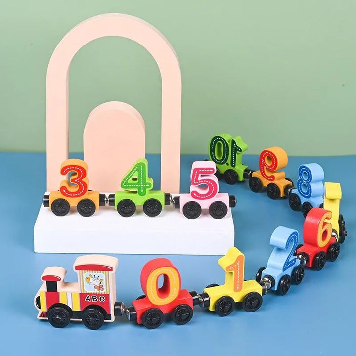 Wooden number train with colorful numeral cars on a blue display