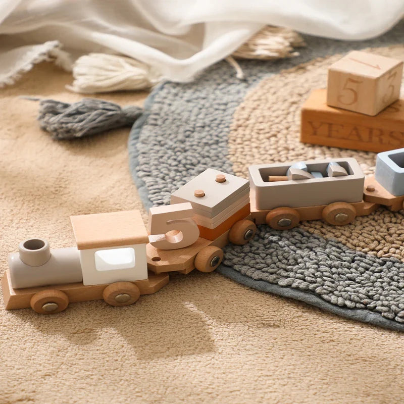 Wooden number train arranged on a textured rug