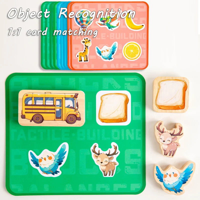 Picture-matching cards beside wooden bread, bird, and horned animal pieces
