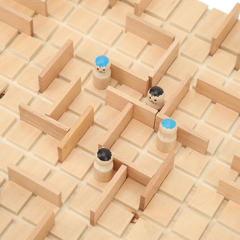 Wooden pawns with blue and black details positioned between barriers on the grid