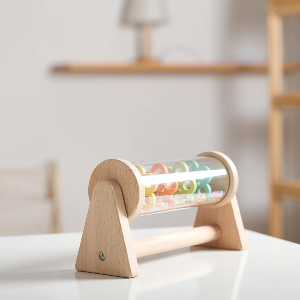 Angled view of the wooden rain toy&