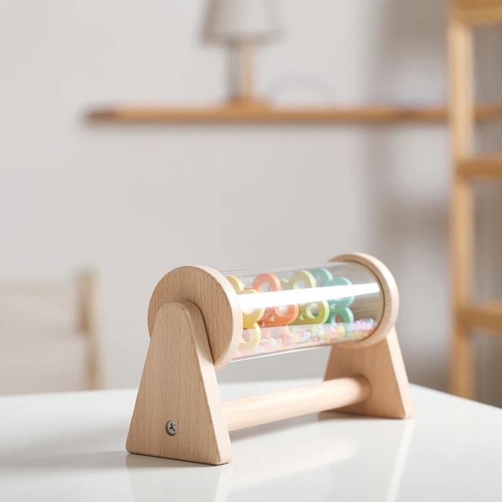 Angled view of the wooden rain toy&