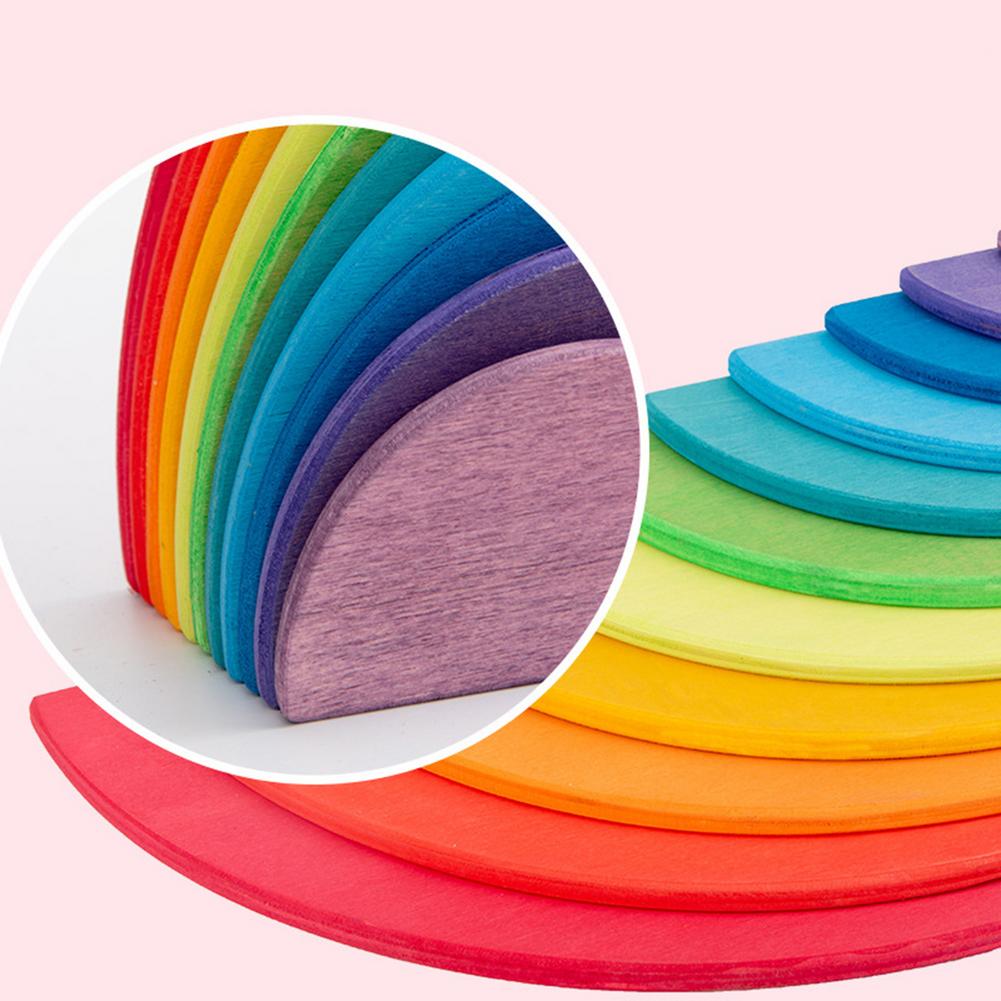 Close-up of colored wooden semicircle discs in upright and layered arrangements
