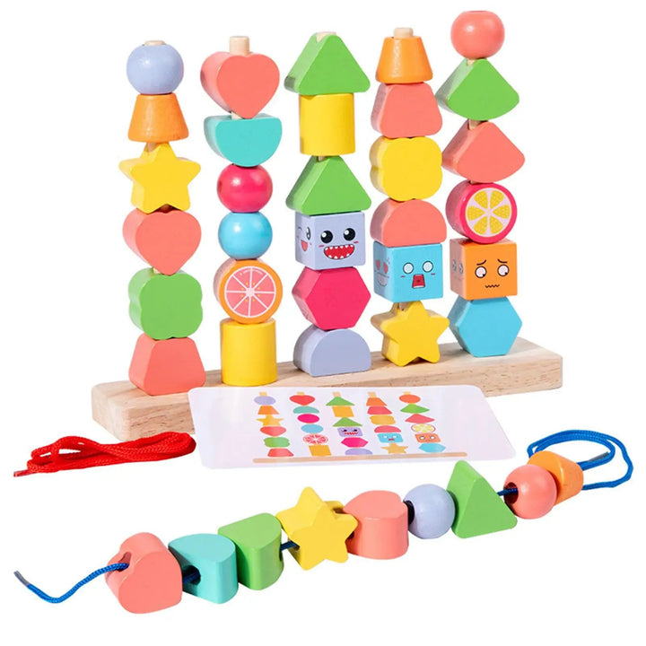 Colorful wooden shape beads stacked on a stand, with a pattern card and beads threaded on a blue cord.