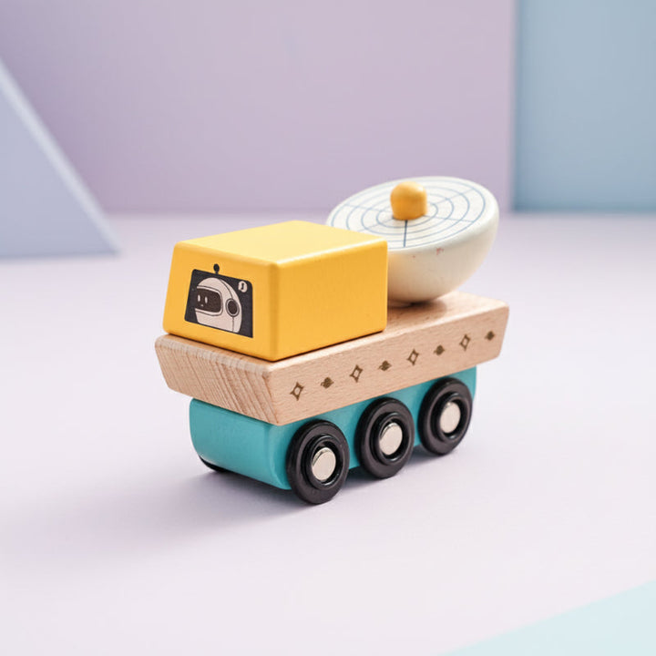 Wooden space car with a yellow cabin, black wheels, and a round dish on top