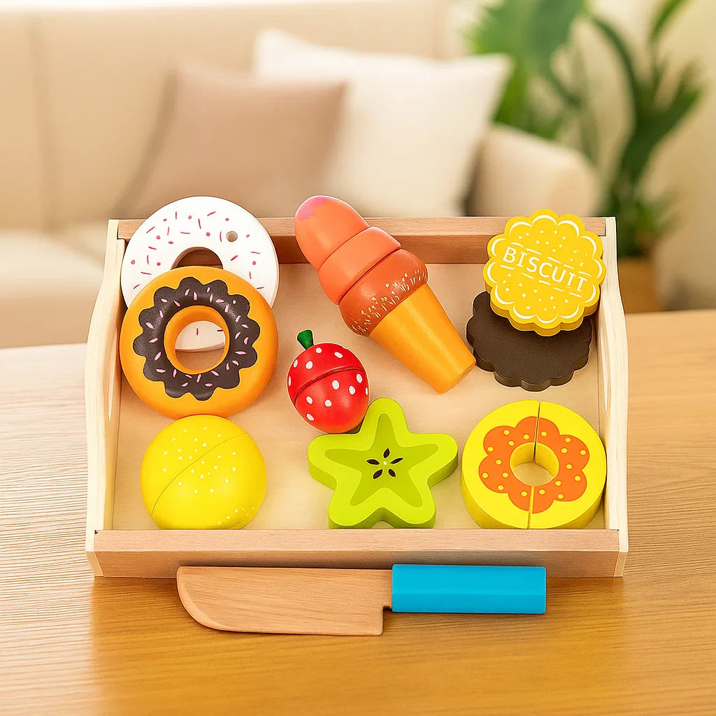 Wooden sweet-treat play food with an ice cream cone, cookies, fruit, and a blue-handled toy knife