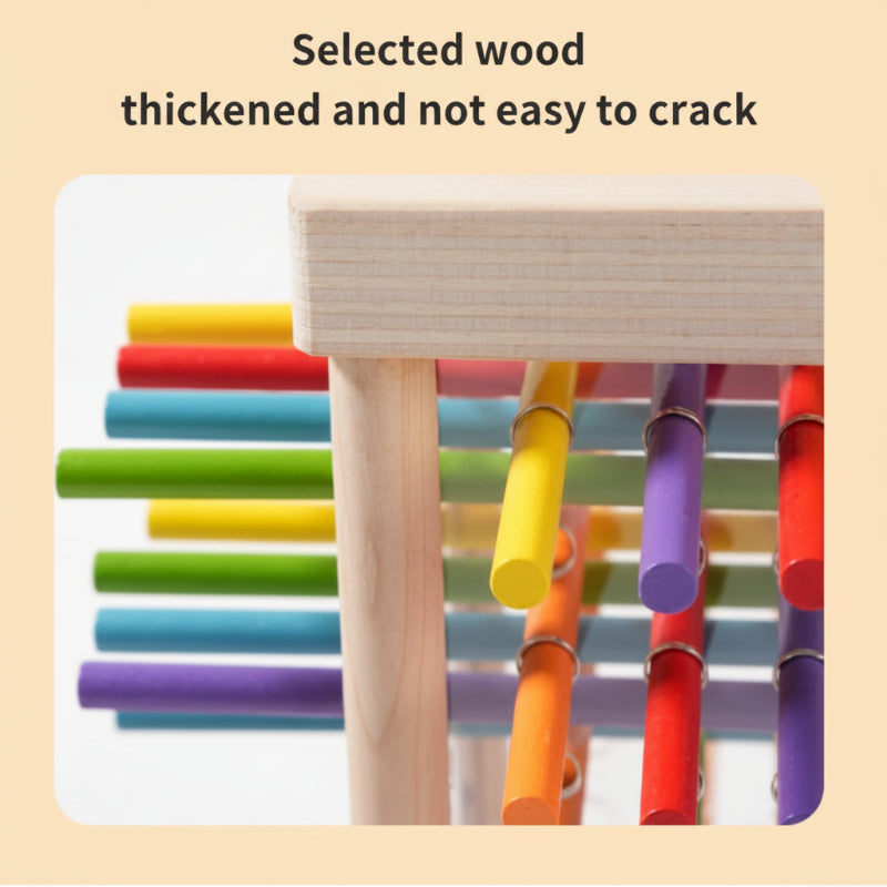 Close-up of a wooden tower frame with colorful sticks passing through its sides.