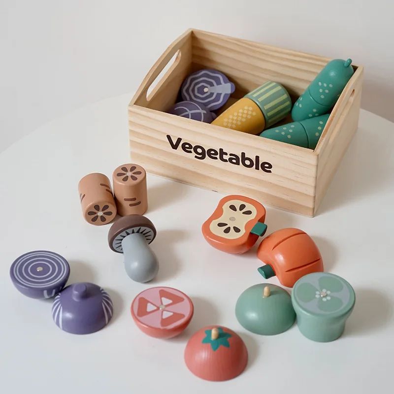 Wooden vegetable play food with corn, onion, tomato, pepper, and a storage crate
