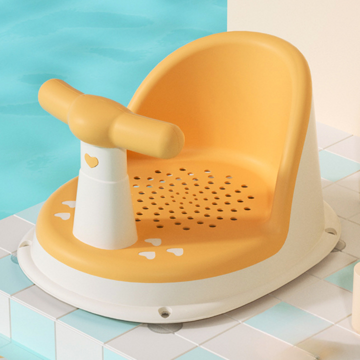 Yellow baby bath seat with a curved backrest and cream-colored base