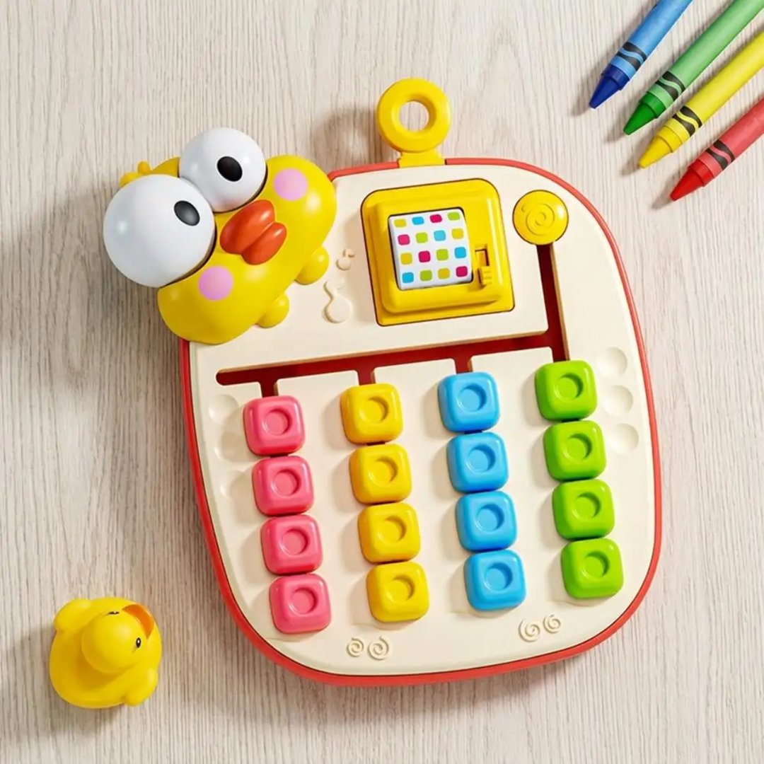 Yellow bird-themed sliding puzzle on a tabletop beside colored pencils