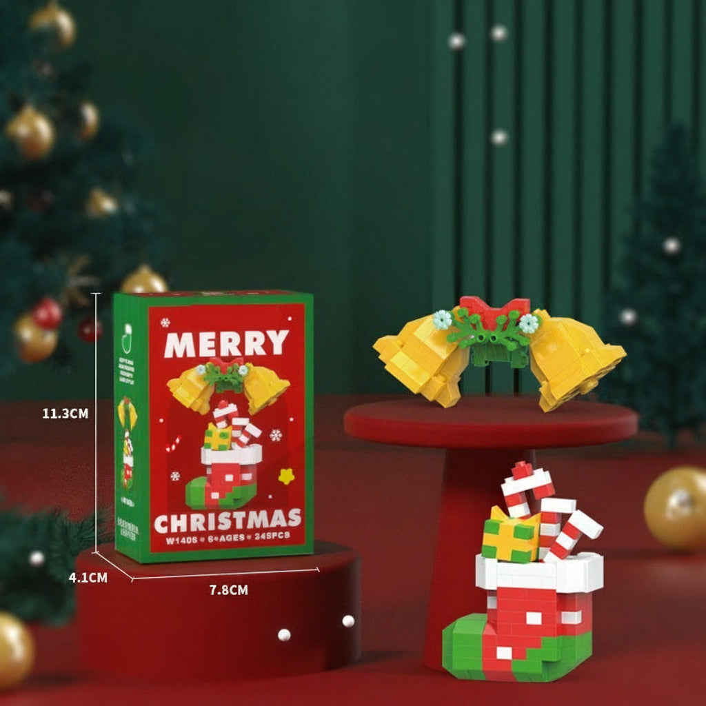 Yellow block bells and a Christmas stocking model displayed with their box