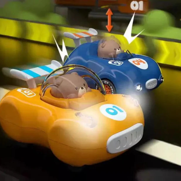 Yellow and blue toy race cars with light-up headlights and bear drivers