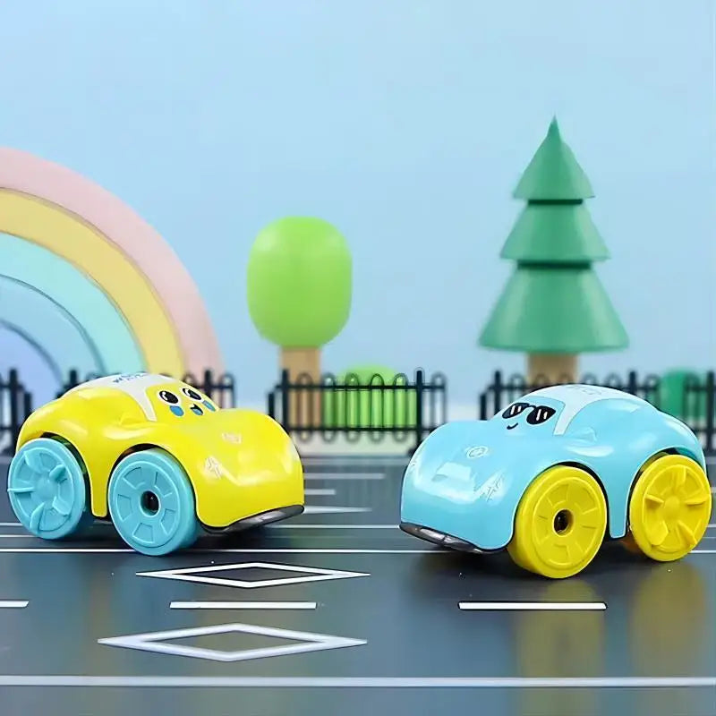 Yellow and blue toy cars with colorful wheels on a miniature road.