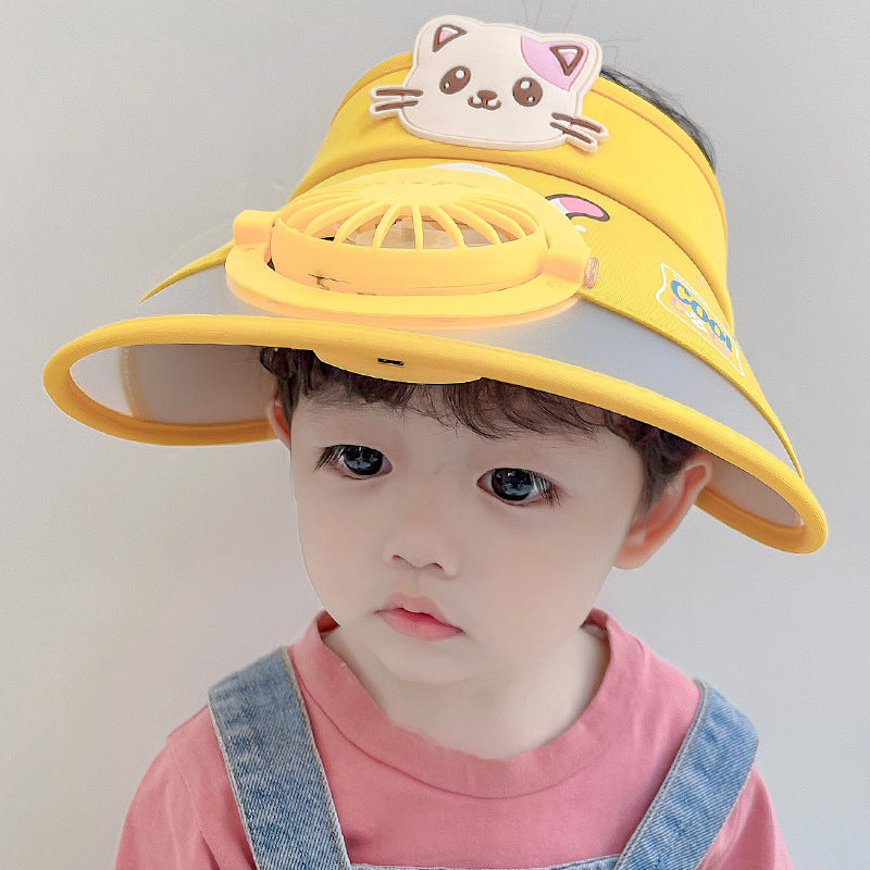 Child wearing a yellow fan hat with a cat decoration and matching fan