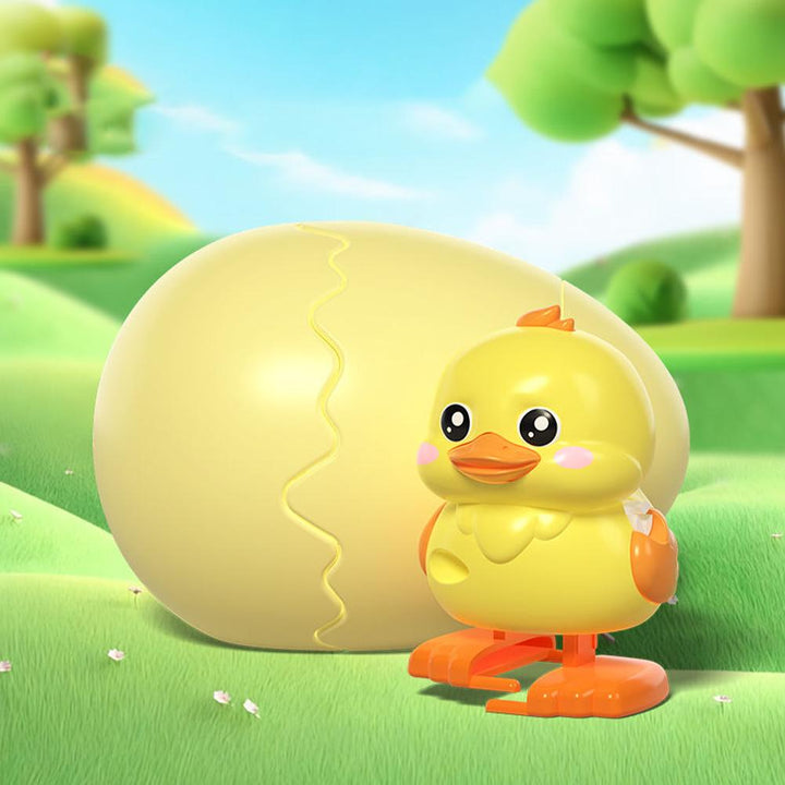 Yellow chick wind-up figure with a matching yellow egg