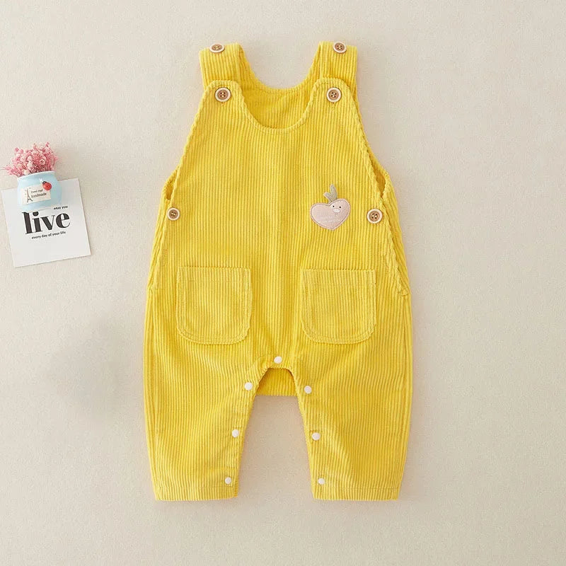 Yellow ribbed cotton baby overalls with front pockets and a small chest applique