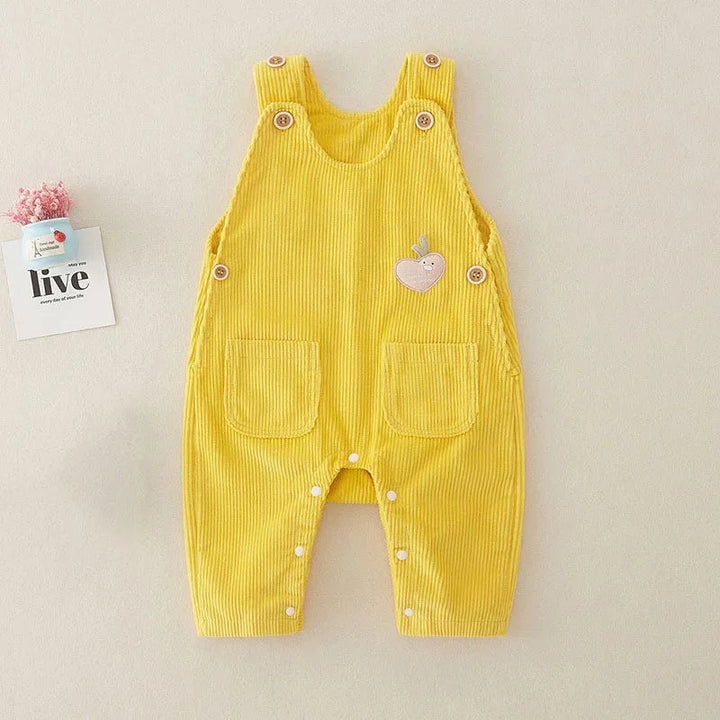 Yellow ribbed cotton baby overalls with front pockets and a small chest applique