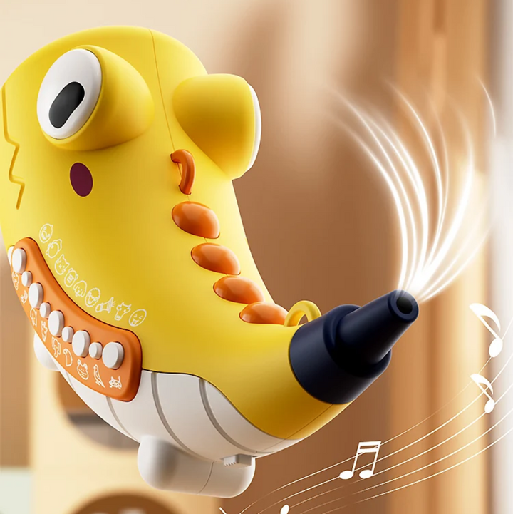 Yellow crocodile musical toy with orange buttons and a blue mouthpiece
