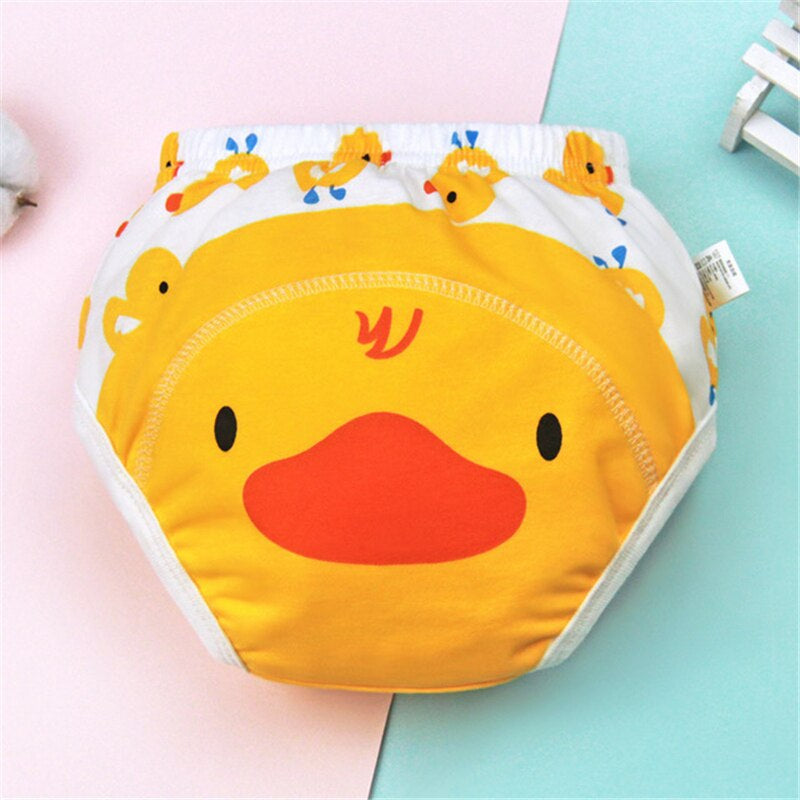 Yellow duck training pants with a cartoon face and elastic waistband