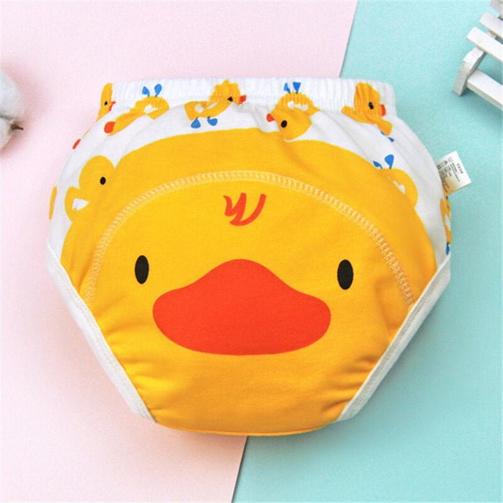 Yellow duck training pants with a cartoon face and elastic waistband