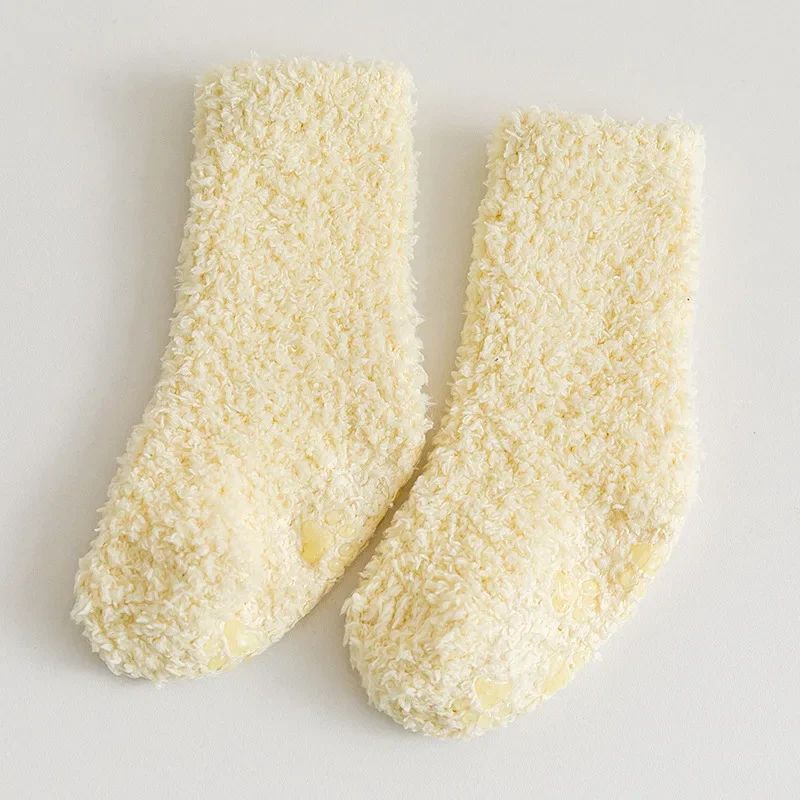 Yellow fleece socks displayed as a pair on a light background.