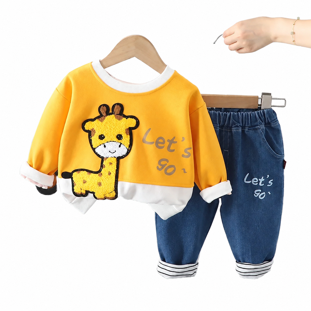 Yellow giraffe sweatshirt paired with blue pants and striped ankle cuffs
