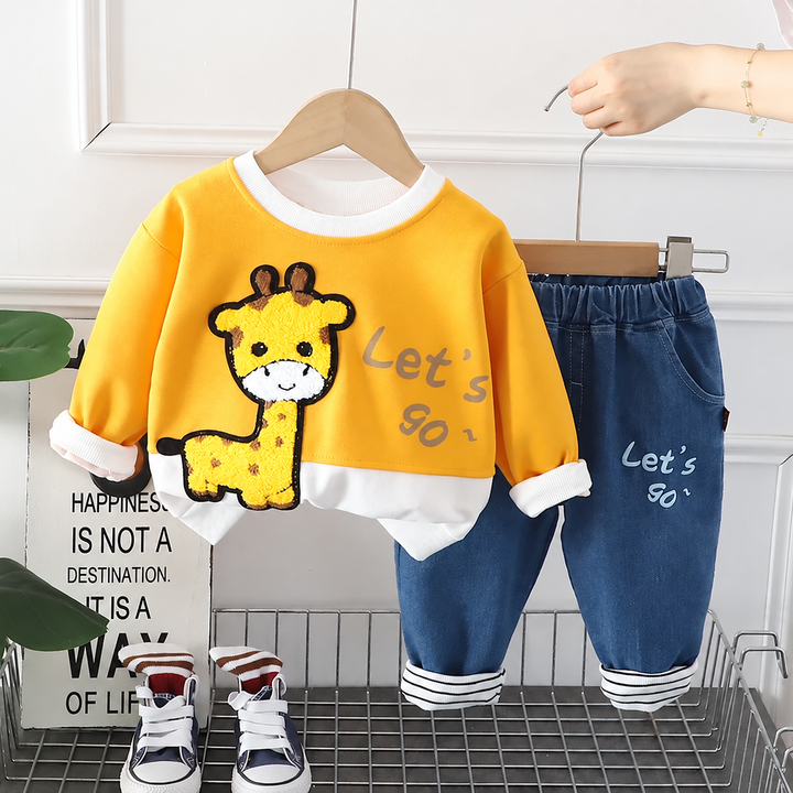 Yellow giraffe sweatshirt with a white neckline, paired with blue pants with striped cuffs