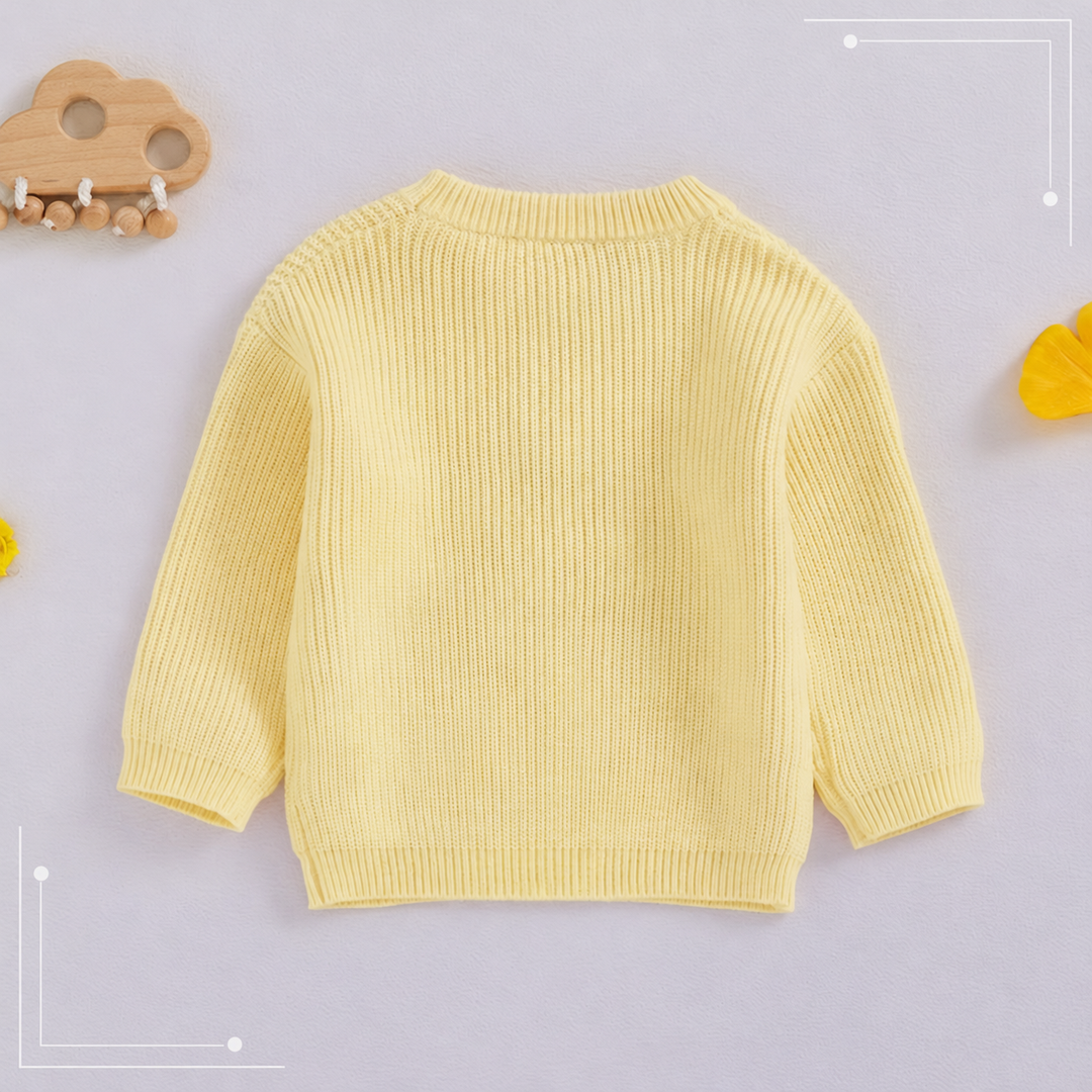 Back view of the yellow sweater with long sleeves and ribbed trim.