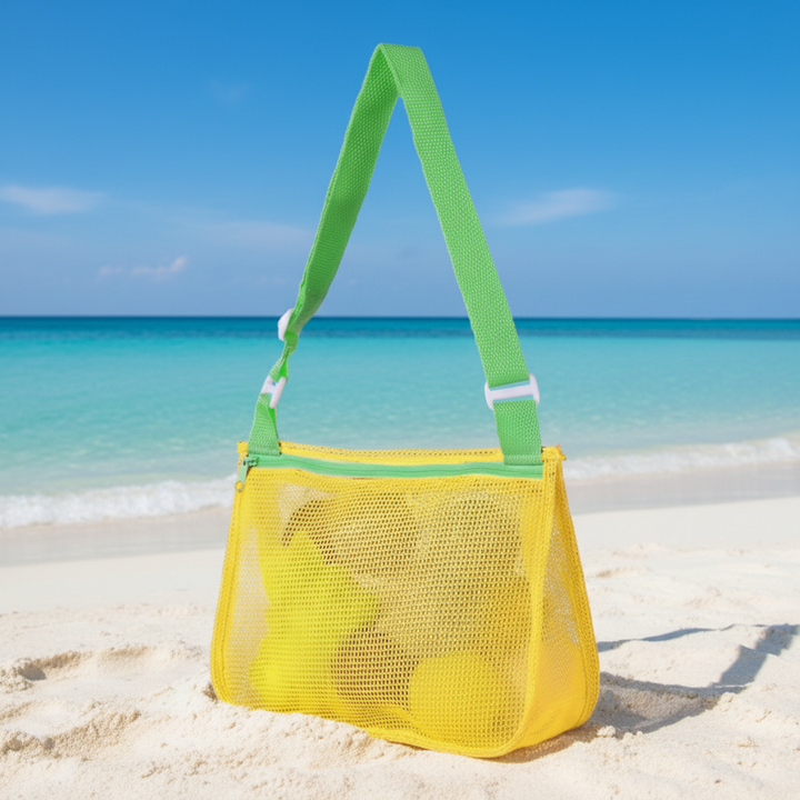 Yellow mesh beach bag with a green adjustable shoulder strap
