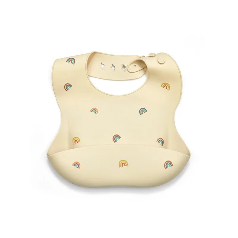 Pale yellow silicone baby bib with rainbow print and a wide front pocket