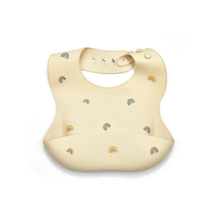 Pale yellow silicone baby bib with rainbow print and a wide front pocket