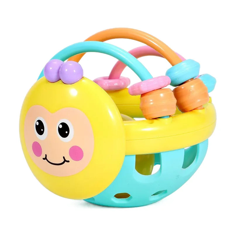 Yellow sensory chew toy with a turquoise base, curved arches, and colorful rings