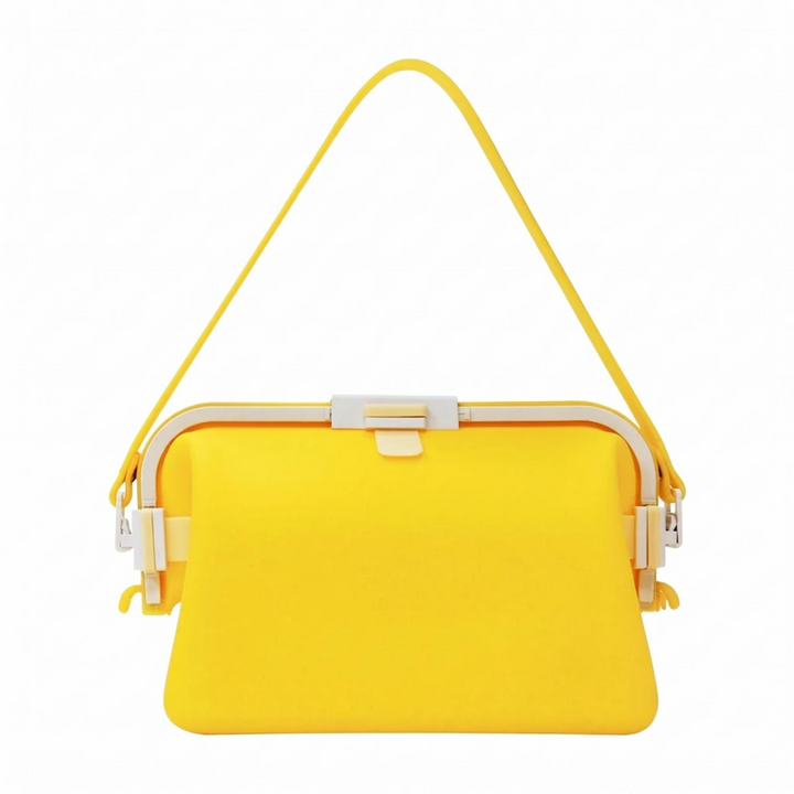 Yellow silicone shoulder bag with a raised yellow strap and front clasp.