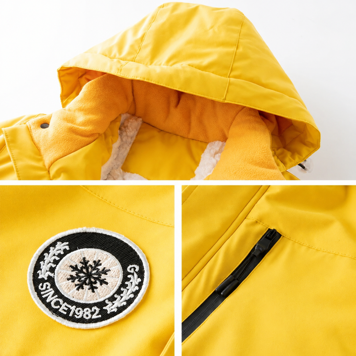 Yellow ski jacket details showing the hood, circular patch, and zippered chest pocket