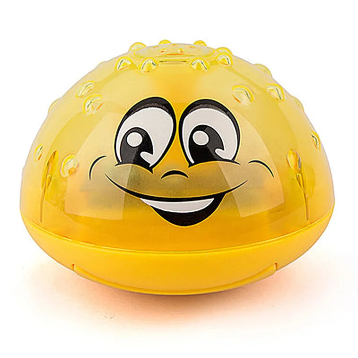 Yellow LED bath ball with a smiling face and translucent dome