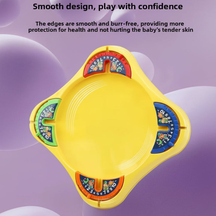 Top view of the yellow spinning top board with four numbered corner scoring stations.