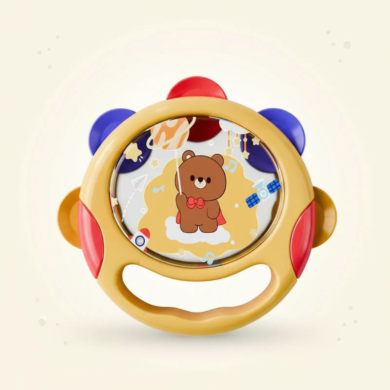 Front view of the yellow tambourine with a curved handle below the bear illustration