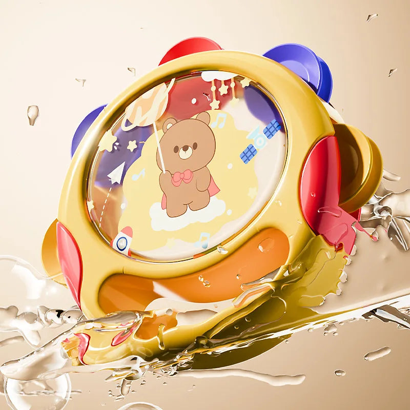 Yellow handheld tambourine pictured with splashing water