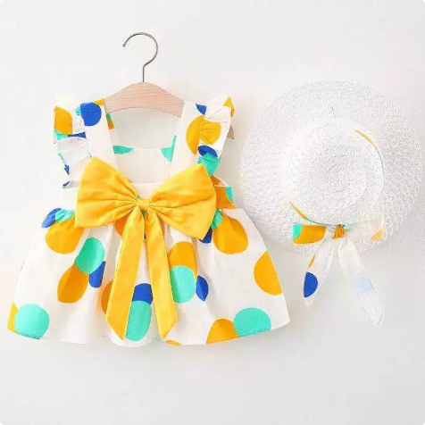 Yellow and teal polka-dot dress with a yellow bow and coordinating straw hat