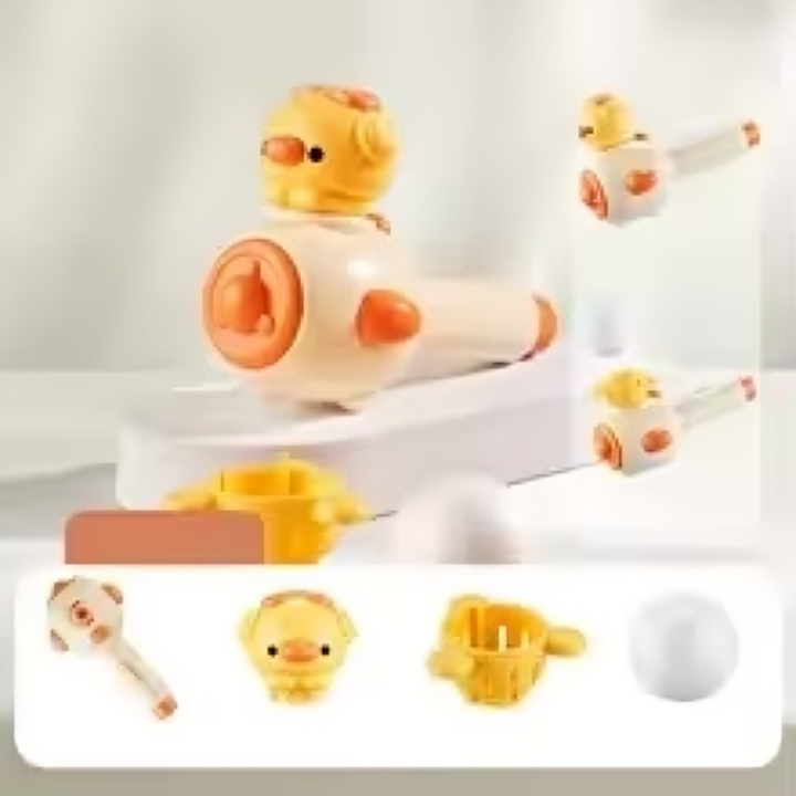 Yellow 2-in-1 blowing toy shown with the chick-shaped head fitted and ball basket alongside.